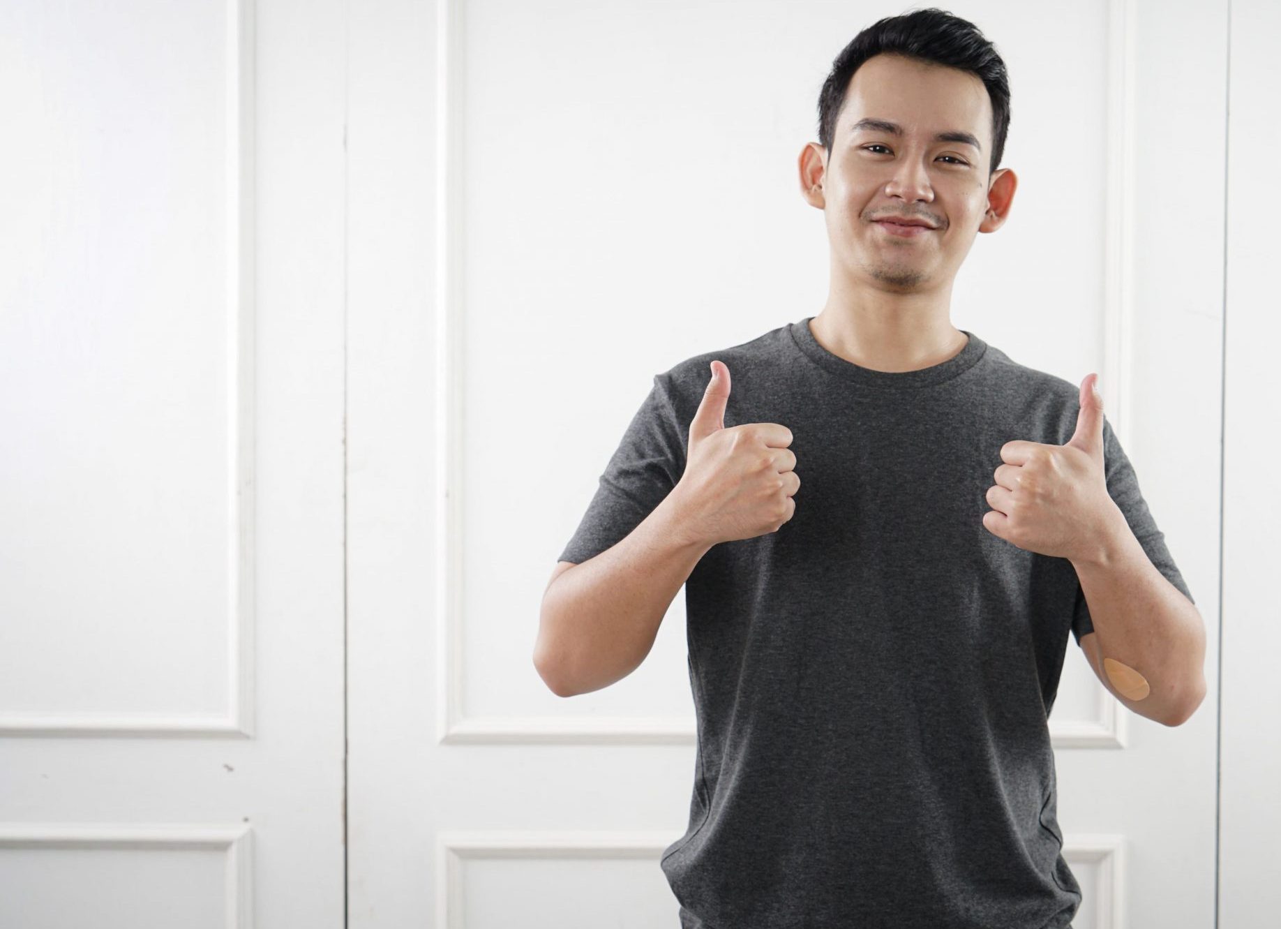 a man thumbs up to the camera a man thumbs up to the camera