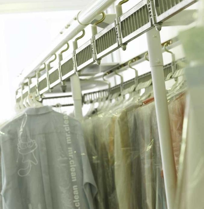 invetory Packed garments are hanging on the automatic conveyor system