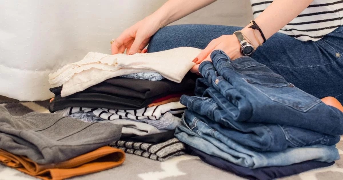 a woman folding the clothes
