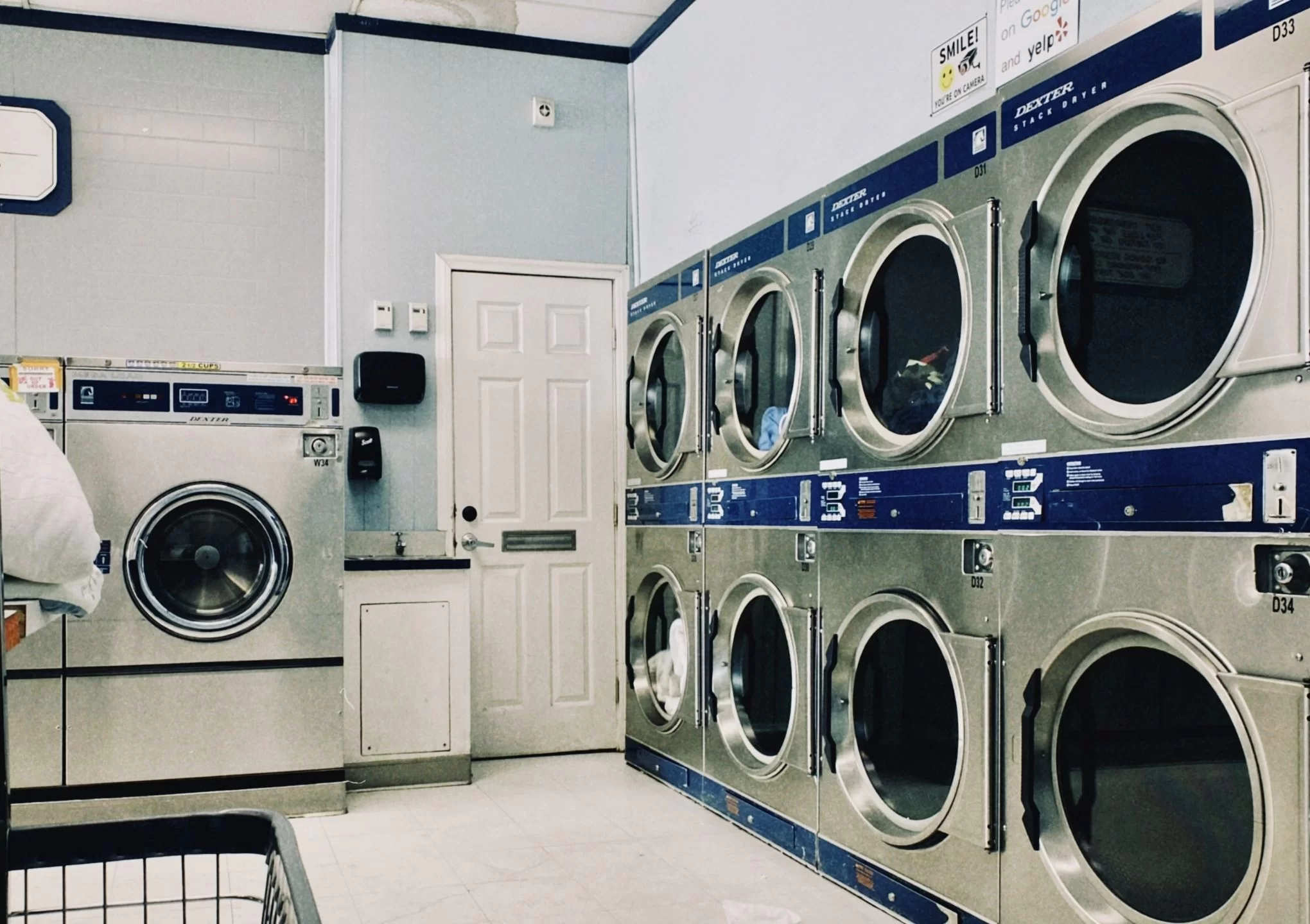 internal look of a coin laundry shop - featured