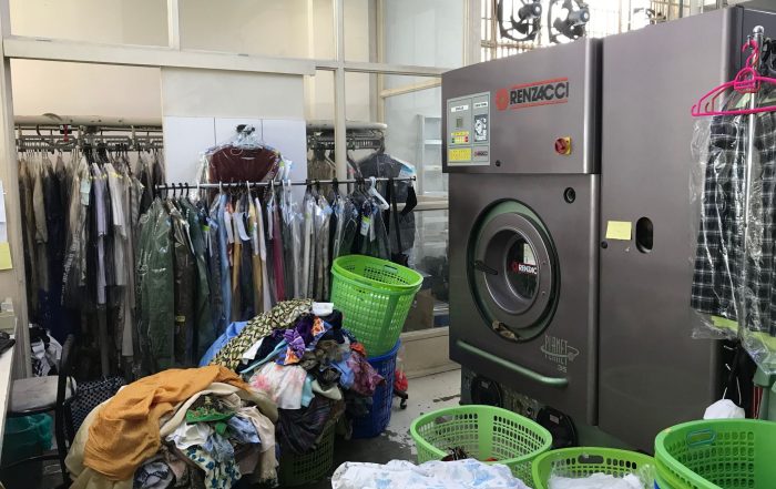 internal look of dry cleaning shop - Post Featured Image