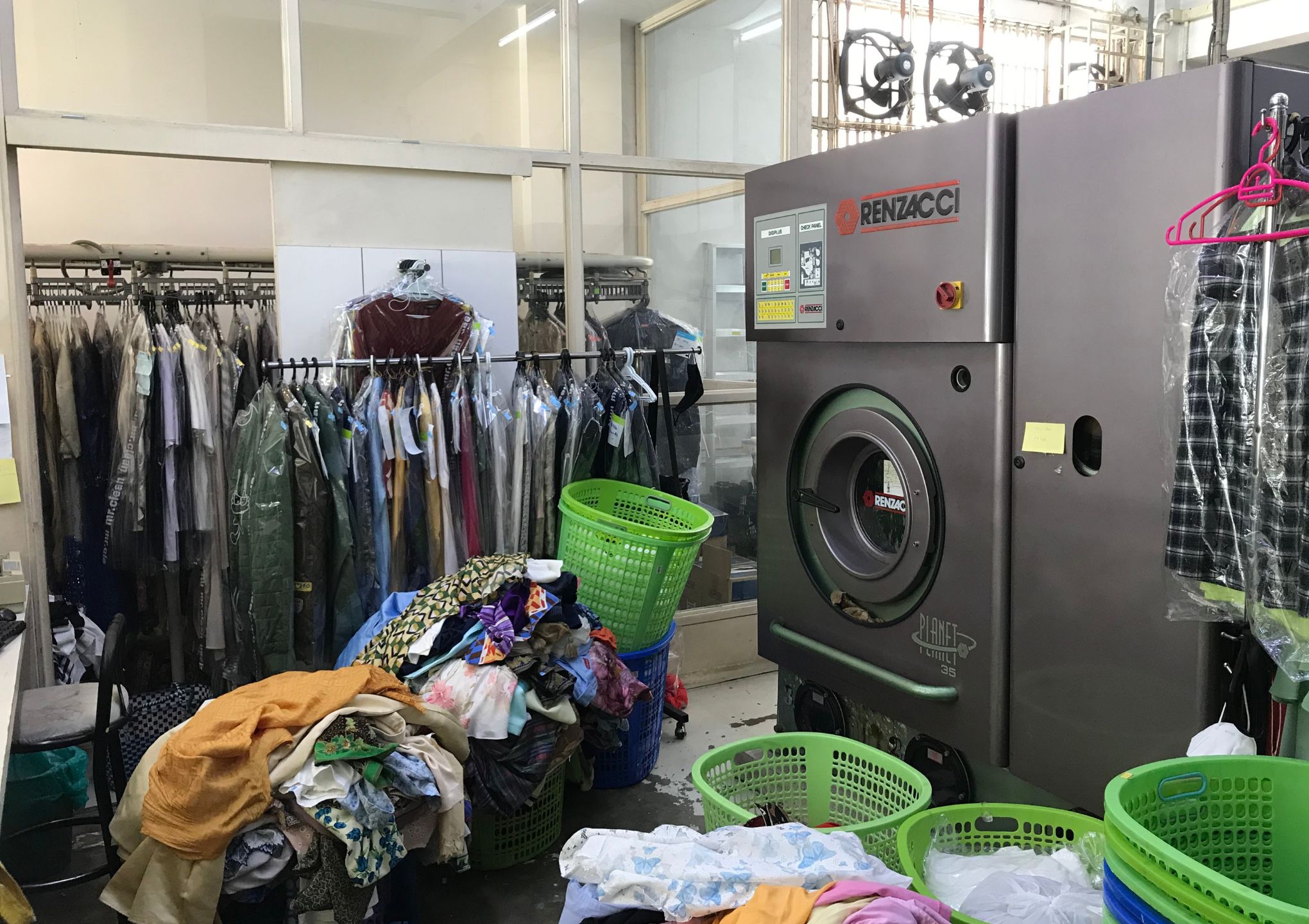 internal look of dry cleaning shop - Post Featured Image